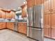 Kitchen featuring stainless steel appliances, tile floors, and ample cabinetry at 3771 Club Nw Dr, Kennesaw, GA 30144