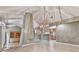 Living room with tile floors, high ceilings, and open access to kitchen at 3771 Club Nw Dr, Kennesaw, GA 30144