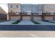 A street view of a block of townhomes with driveways at 3774 Jack Vernon Cir, Powder Springs, GA 30127