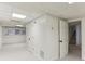 Finished basement with drop ceiling and door to the stairs at 630 Dana Pointe Ct, Lawrenceville, GA 30045