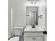 Classic bathroom with white vanity, black faucet, and neutral walls at 630 Dana Pointe Ct, Lawrenceville, GA 30045