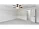 Bedroom with a lot of doors, carpet, and natural light at 630 Dana Pointe Ct, Lawrenceville, GA 30045