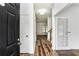 Inviting foyer with hardwood floors and a view into the living spaces at 630 Dana Pointe Ct, Lawrenceville, GA 30045