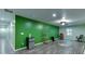Spacious basement featuring sleek flooring, a large accent wall and ample room for entertaining or storage at 1258 Rocky Branch Trl, Lawrenceville, GA 30043