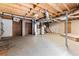 Unfinished basement with exposed ductwork and wooden beams at 129 Bill Smith Dr, Canton, GA 30114
