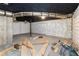 Spacious unfinished basement with exposed ductwork and concrete walls at 129 Bill Smith Dr, Canton, GA 30114