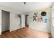 Bedroom with wood-look floors and wall drawings at 129 Bill Smith Dr, Canton, GA 30114