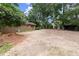 Large yard with trees around the property at 129 Bill Smith Dr, Canton, GA 30114