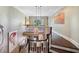 Hallway with hardwood floors, modern lighting, and artwork at 2883 Andrews Nw Dr, Atlanta, GA 30305
