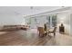 Spacious living room with a large couch, dining table, and lots of natural light at 2883 Andrews Nw Dr, Atlanta, GA 30305