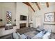Inviting outdoor living space with fireplace, wet bar, grill, and comfortable seating at 2883 Andrews Nw Dr, Atlanta, GA 30305