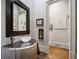 Powder room featuring modern fixtures and artwork at 2883 Andrews Nw Dr, Atlanta, GA 30305