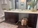 Functional bathroom vanity with storage beneath and decorative accents throughout at 3915 Woodridge Way, Tucker, GA 30084