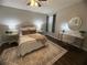 Bedroom with a ceiling fan and decorative area rug and a writing desk with decor at 3915 Woodridge Way, Tucker, GA 30084