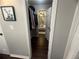 Walk-in closet leading to a bedroom, providing ample storage and organization at 3915 Woodridge Way, Tucker, GA 30084
