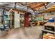Unfinished basement with duct work, exposed ceiling, and storage shelves at 1630 Park Ln, Marietta, GA 30066