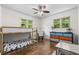 Cozy bedroom features a bunk bed, desk, and dresser at 1630 Park Ln, Marietta, GA 30066