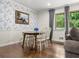 Charming dining room with floral wallpaper and natural light at 1630 Park Ln, Marietta, GA 30066