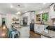Elegant kitchen with granite counters, stainless steel appliances, and island seating at 1630 Park Ln, Marietta, GA 30066