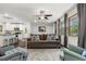 Bright and airy living room with hardwood floors, large windows, and a comfortable seating area with modern decor at 1630 Park Ln, Marietta, GA 30066