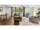 Bright living area with hardwood floors, large windows, and neutral decor at 1630 Park Ln, Marietta, GA 30066