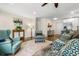 Spacious living room with hardwood floors, stylish furniture, and an open layout leading to the kitchen at 1630 Park Ln, Marietta, GA 30066