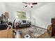 Office space with a modern desk, comfortable sofa, and ample lighting at 1630 Park Ln, Marietta, GA 30066