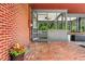 Covered brick patio featuring an outdoor seating area, ideal for entertaining guests or enjoying quiet moments at 1630 Park Ln, Marietta, GA 30066