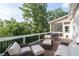 Spacious deck with outdoor seating, ideal for entertaining and enjoying serene views at 1745 Habersham Marina Rd, Cumming, GA 30041