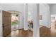 Bright foyer featuring hardwood floors and a view into the dining room at 1745 Habersham Marina Rd, Cumming, GA 30041