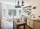Kitchen nook with modern lighting, shiplap accent wall, and eat-in space at 1745 Habersham Marina Rd, Cumming, GA 30041