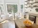Sunlit eat-in kitchen area with modern design, and views to the backyard at 1745 Habersham Marina Rd, Cumming, GA 30041