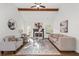 Spacious living room featuring hardwood floors, fireplace, and neutral decor at 1745 Habersham Marina Rd, Cumming, GA 30041