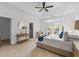 Main bedroom with ensuite bathroom and private balcony access at 1745 Habersham Marina Rd, Cumming, GA 30041
