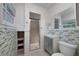 Bathroom with modern vanity, walk-in shower, mosaic tiles, and built in shelving at 3080 Lynhurst Cir, Atlanta, GA 30311