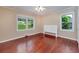 Bedroom featuring hardwood floors and two large windows for plenty of light at 3080 Lynhurst Cir, Atlanta, GA 30311