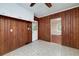 Mud room with tile floors, wood paneling, and view to the backyard at 3080 Lynhurst Cir, Atlanta, GA 30311