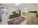 Basement space with storage bins and rug plus doorway to laundry or utility area at 4525 Cavallon Nw Way, Acworth, GA 30101