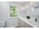 Bathroom with double sinks and modern fixtures at 4525 Cavallon Nw Way, Acworth, GA 30101