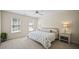 Bedroom with neutral walls, ceiling fan, and carpet at 4525 Cavallon Nw Way, Acworth, GA 30101
