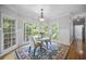 Cozy breakfast nook with large windows and a decorative chandelier at 4525 Cavallon Nw Way, Acworth, GA 30101
