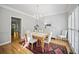 Bright dining room featuring wood floors, white furniture, and natural light at 4525 Cavallon Nw Way, Acworth, GA 30101