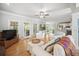 Spacious living room with hardwood floors seamlessly flows into the open concept kitchen at 4525 Cavallon Nw Way, Acworth, GA 30101