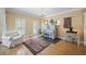 Cozy sitting room with hardwood floors, shutters, and lovely decor at 4525 Cavallon Nw Way, Acworth, GA 30101