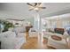 Bright and open living room with hardwood floors and views into the kitchen at 4525 Cavallon Nw Way, Acworth, GA 30101