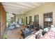 Inviting screened porch with ample seating and ceiling fan, perfect for relaxing at 4525 Cavallon Nw Way, Acworth, GA 30101