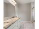 Bathroom featuring a granite countertop, double sinks, and tiled floors at 1463 Edgebrook Ne Ct # 14, Atlanta, GA 30329