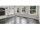 Bright dining area with hardwood floors, bench seating, and multiple windows for natural light at 1463 Edgebrook Ne Ct # 14, Atlanta, GA 30329
