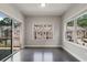 Dining area with sliding glass doors to the deck, and large windows at 1463 Edgebrook Ne Ct # 14, Atlanta, GA 30329