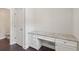 Bright home office with built-in desk, drawers, and granite countertop at 1463 Edgebrook Ne Ct # 14, Atlanta, GA 30329